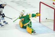Jets left wing Kyle Connor scores on Wild goaltender Marc-Andre Fleury during in the first period Saturday at Xcel Energy Center.