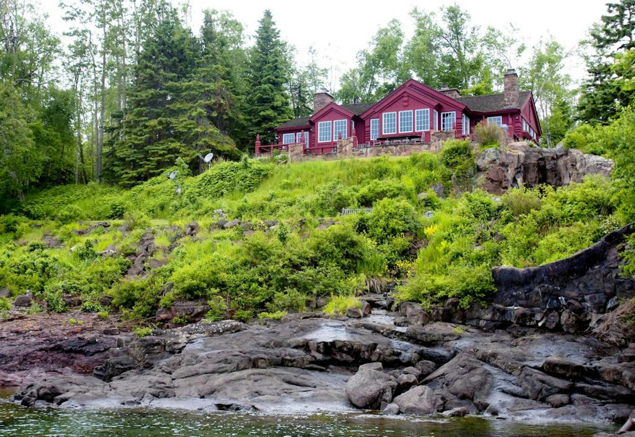 Derek Montgomery Photography A view of the outside of Shore Creek, a cabin built by the reknowned St. Paul architect Edwin Lundie in 1941. The cabin sits on a hill overlooking Lake Superior.