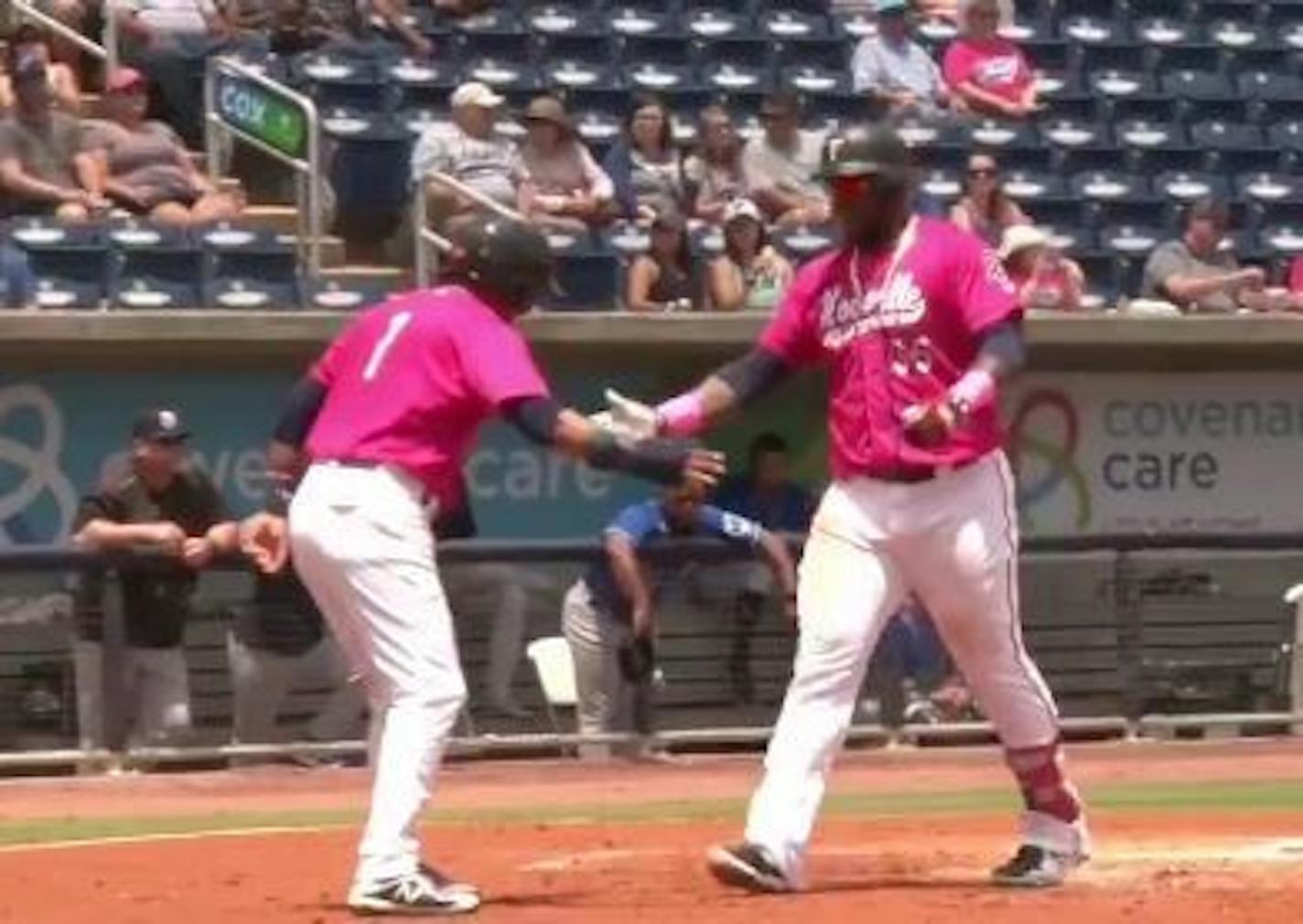 Miguel Sano crosses home plate after hitting a home run Sunday.