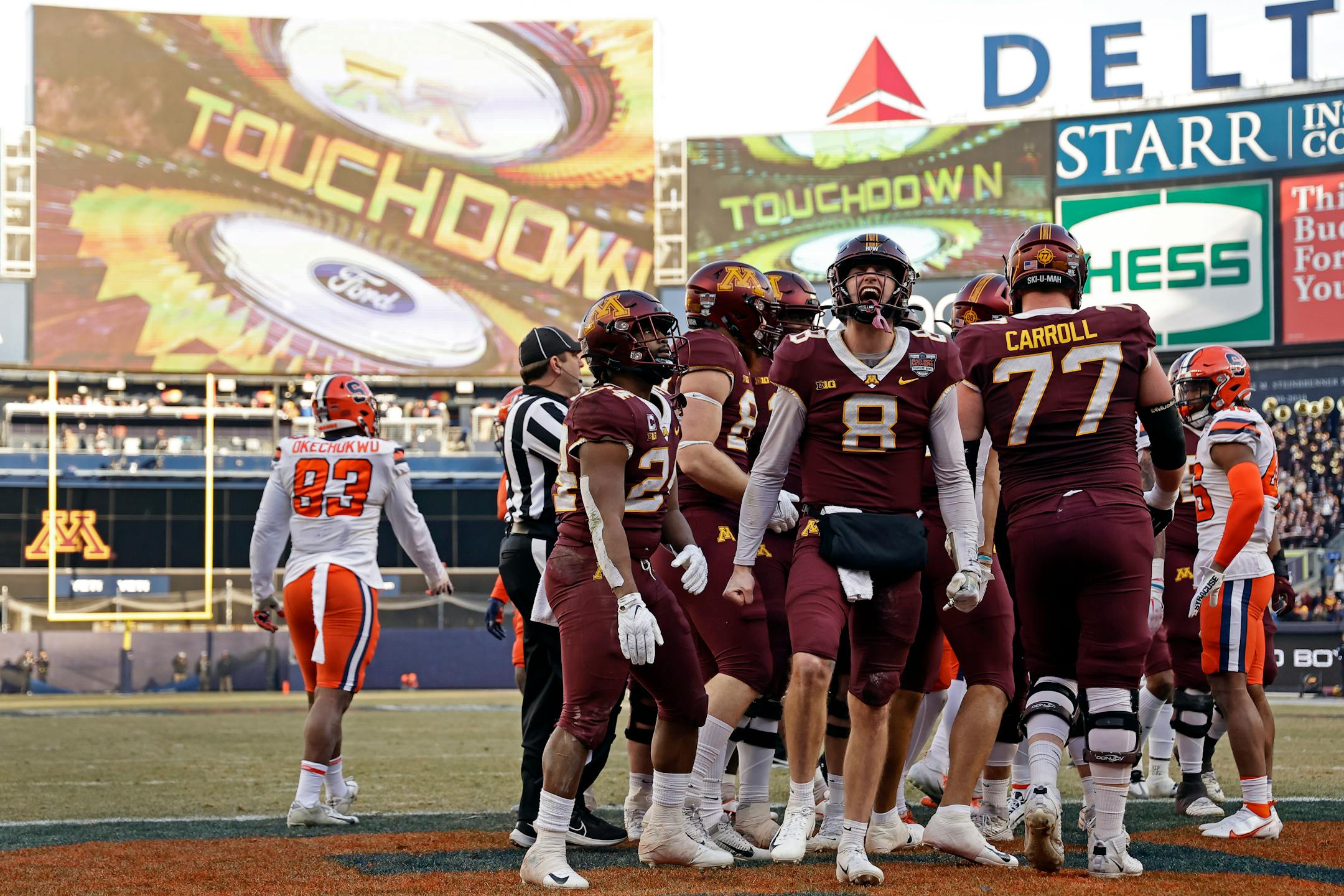 Minnesota quarterback Athan Kaliakmanis (8) reacts after Mohamed Ibrahim scored a touchdown against Syracuse.