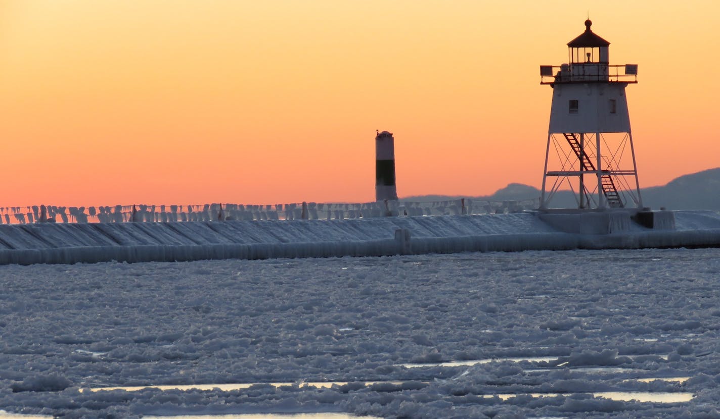 Lake Superior's waves covered the breakwater in ice near the Grand Marais Light tower.