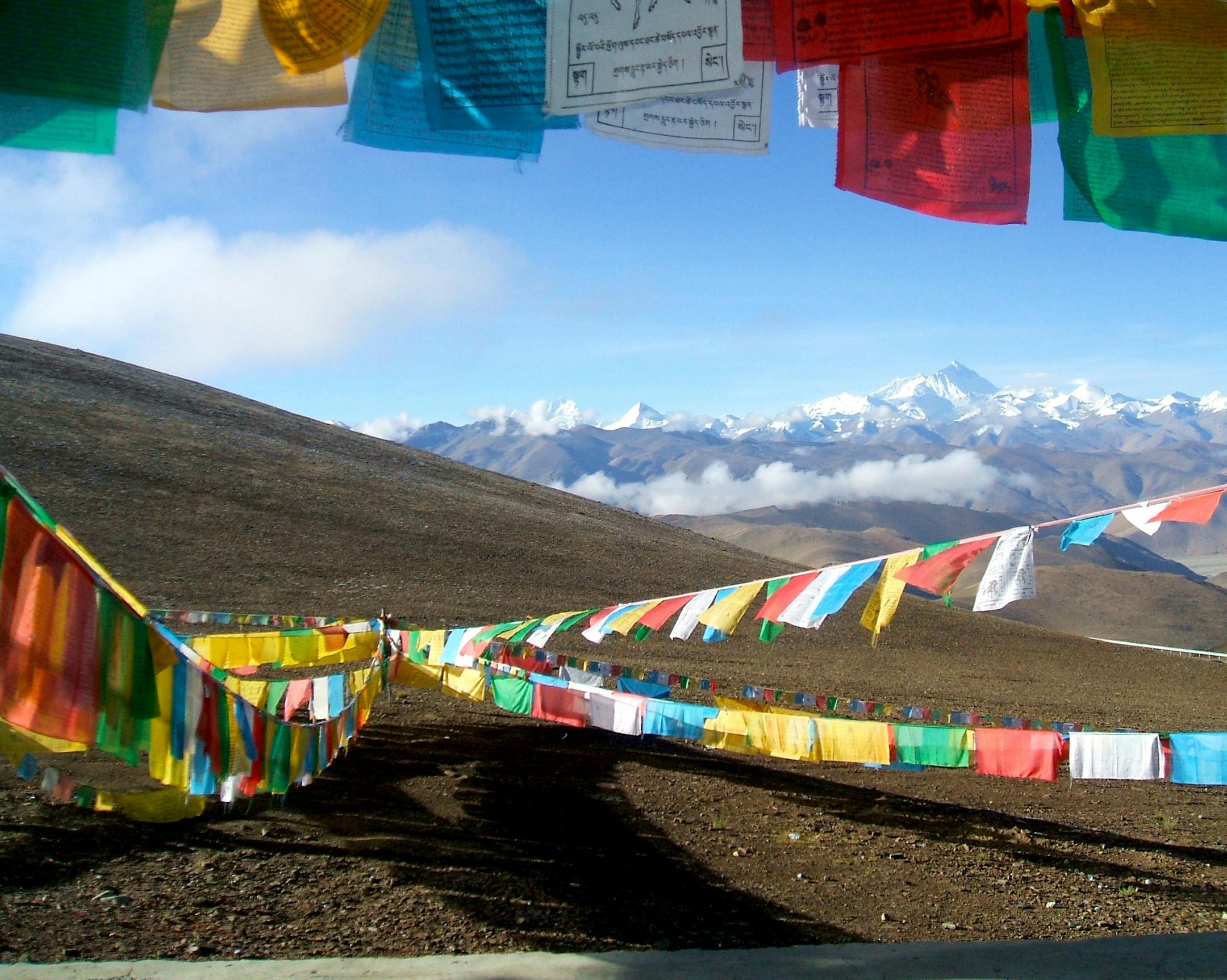 Trudi Juncker, Minneapolis, MN Where were you when you took this photo? What does it show? I was traveling with REI Adventures on its Tibet trip in the fall of 2013. The trip was entitled: Tibet: Journey from Lhasa to Everest. The trip involved some light hiking but mostly car travel at altitude over rough roads. This photo was taken en route to the North Mt Everest base camp and shows Everest in the distance combined with the beauty and harshness of the Tibetan plateau in the foreground. The pr