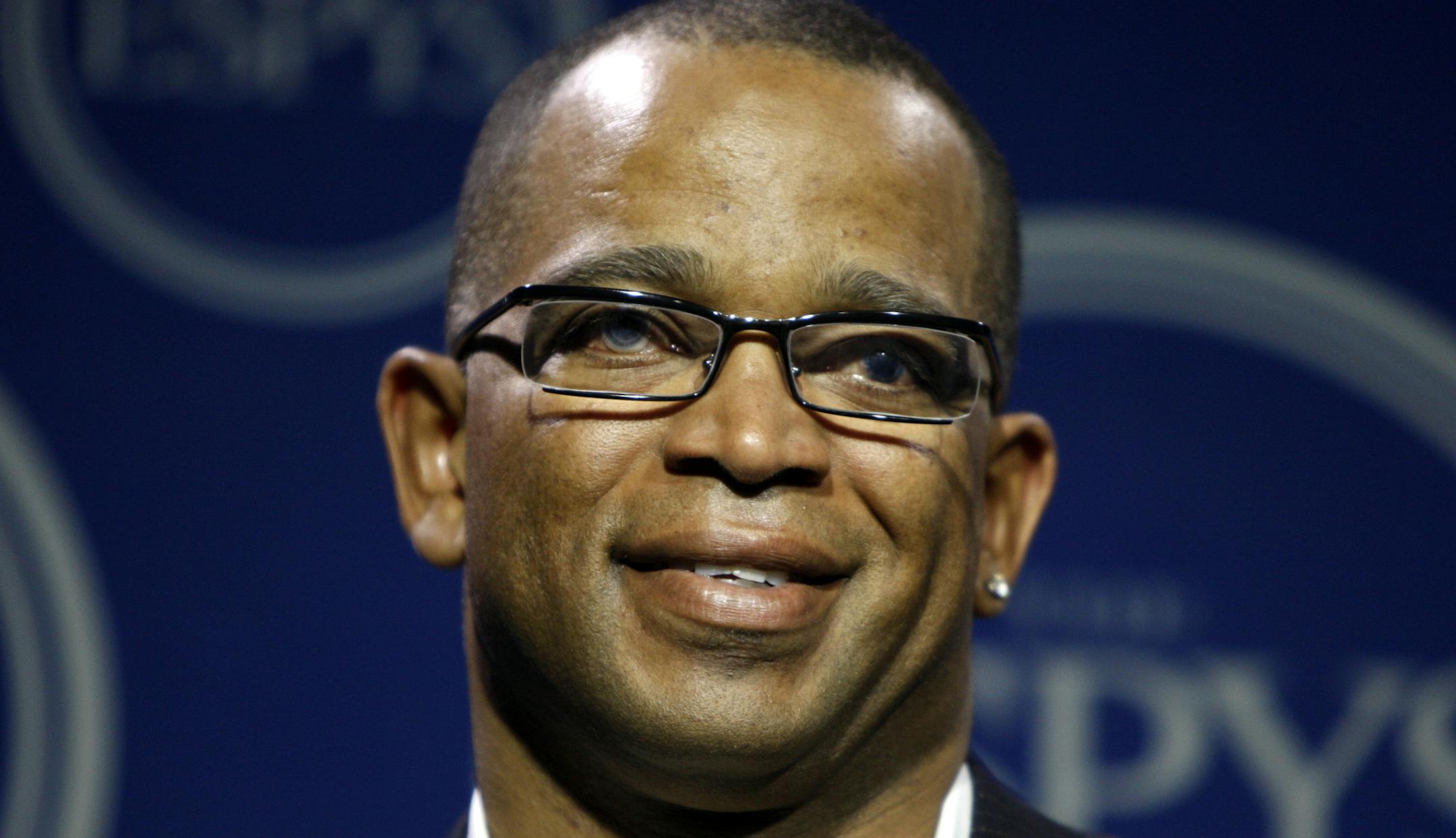 FILE - In a Wednesday, July 16, 2008 file photo, Stuart Scott poses in the press room at the ESPYs Awards,in Los Angeles. Scott, the longtime &#x201c;SportsCenter&#x201d; anchor and ESPN personality known for his known for his enthusiasm and ubiquity, died Sunday, Jan. 4, 2015 after a long fight with cancer. He was 49. (AP Photo/Matt Sayles, File)