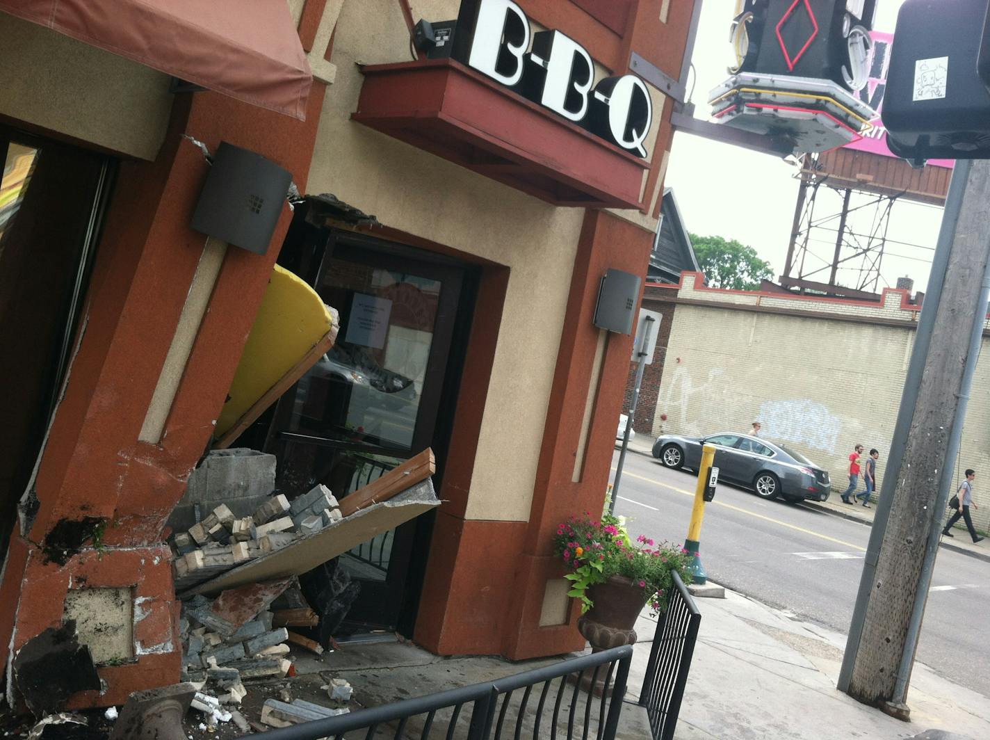 A car crashed into the entrance of Rudolph's, a popular Minneapolis rib joint, on Sunday in Minneapolis.