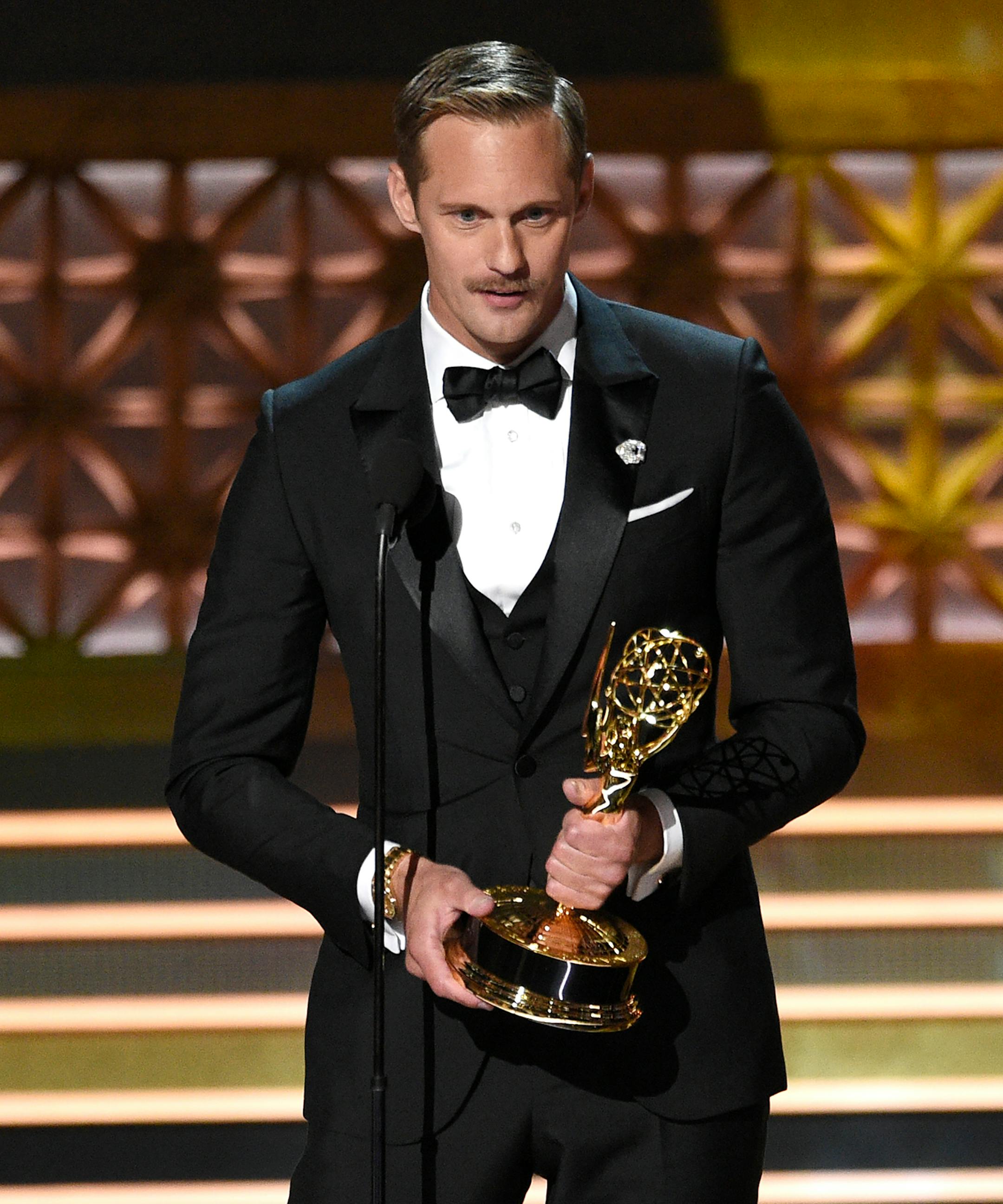 Alexander Skarsgard accepts the award for outstanding supporting actor in a limited series or a movie for "Big Little Lies" at the 69th Primetime Emmy Awards on Sunday, Sept. 17, 2017, at the Microsoft Theater in Los Angeles.