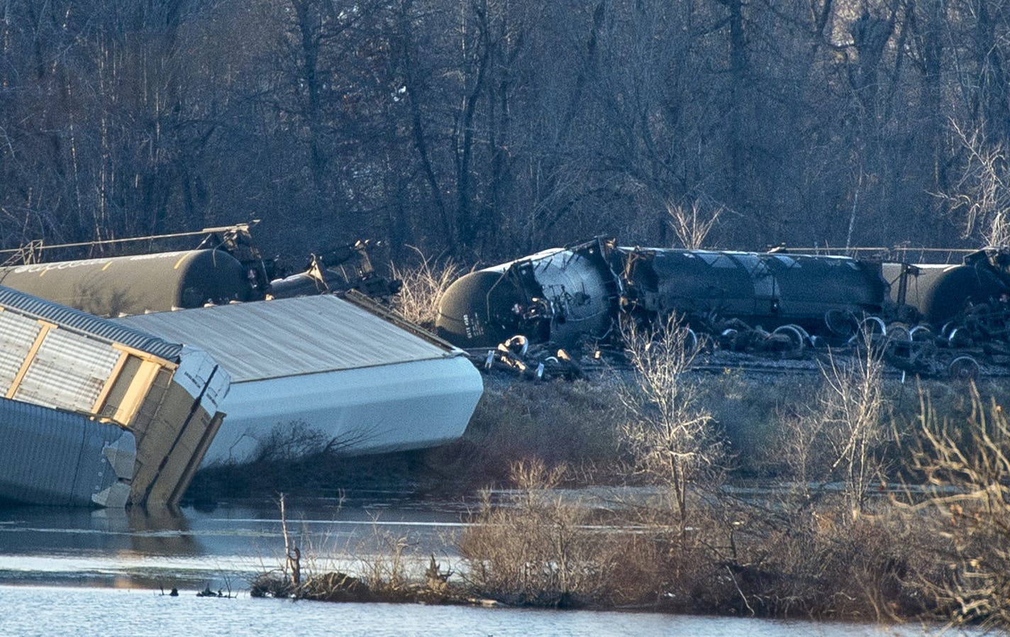 Train cars lie overturned outside of Alma, Wis. after derailing on Saturday, Nov. 7, 2015. BNSF Railway says five tanker cars leaked ethanol into the Mississippi River.