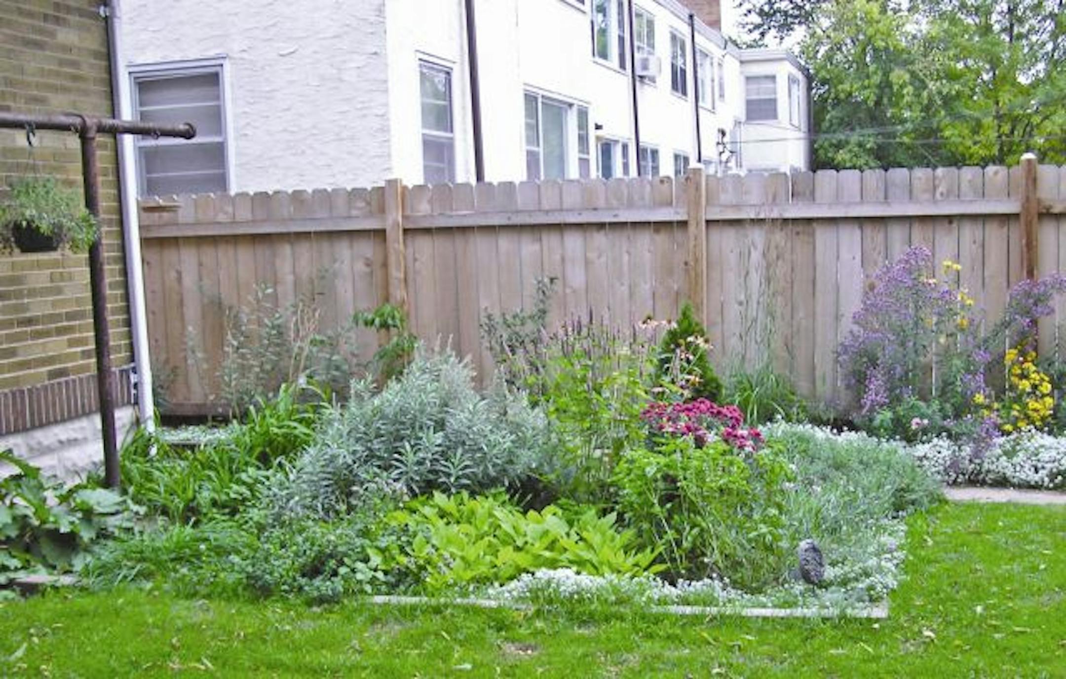 A smaller urban yard with useful plantings. This one was designed by Kristin Matthews Long.
