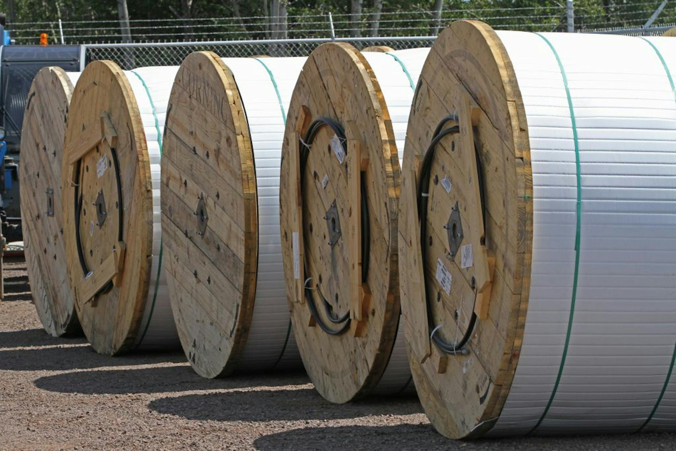 Two and a half miles of fiber-optic cable sit in a northern Minnesota construction yard awaiting installation.