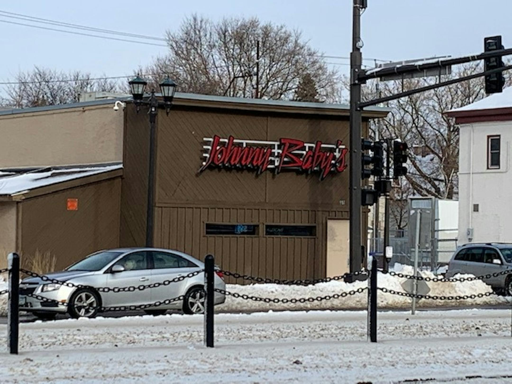 Staff photo by Liz Sawyer: Johnny's Bar in St. Paul. A man was shot to death in the bar's parking lot early Thursday.