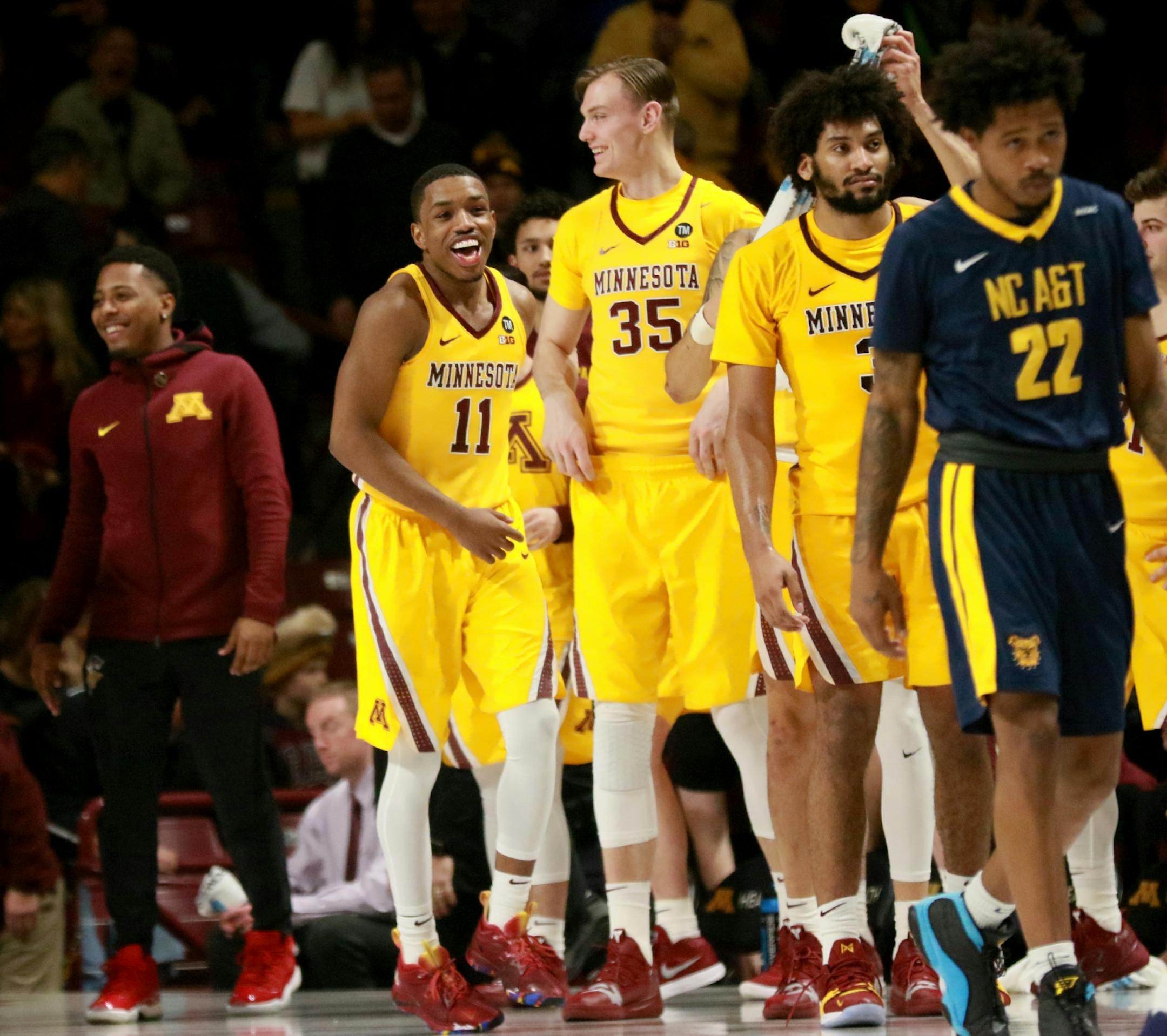 University of Minnesota players celebrate their 86-67 win over North Carolina A&T Friday, Dec. 21, 2018, at Williams Arena in Minneapolis, MN.