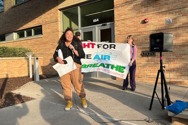 Sophia Benrud of the Minnesota Environmental Justice Table spoke outside a public meeting held by the MPCA this month about the cumulative impact law.