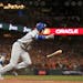 Los Angeles Dodgers’ Cody Bellinger runs to first base after hitting an RBI-single against the San Francisco Giants 