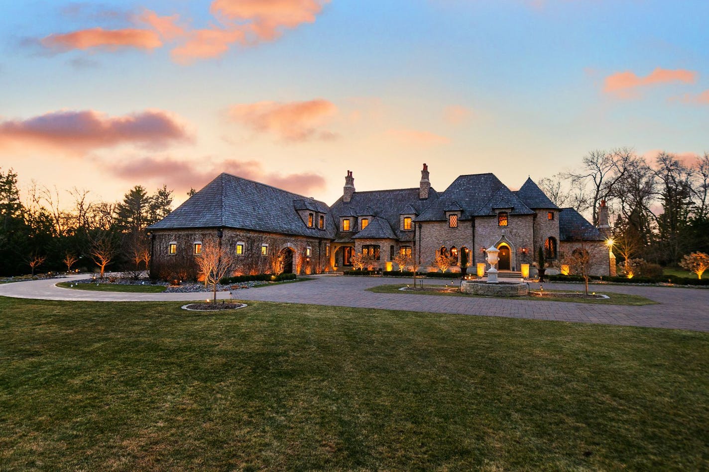 The 11,900-square-foot stately brick house is set on 4 acres in Orono.