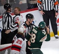 Wild center Ryan Hartman flashed the peace — or victory? — sign after a spat with Devils winger Andreas Johnsson on Dec. 2 at Xcel Energy Center.