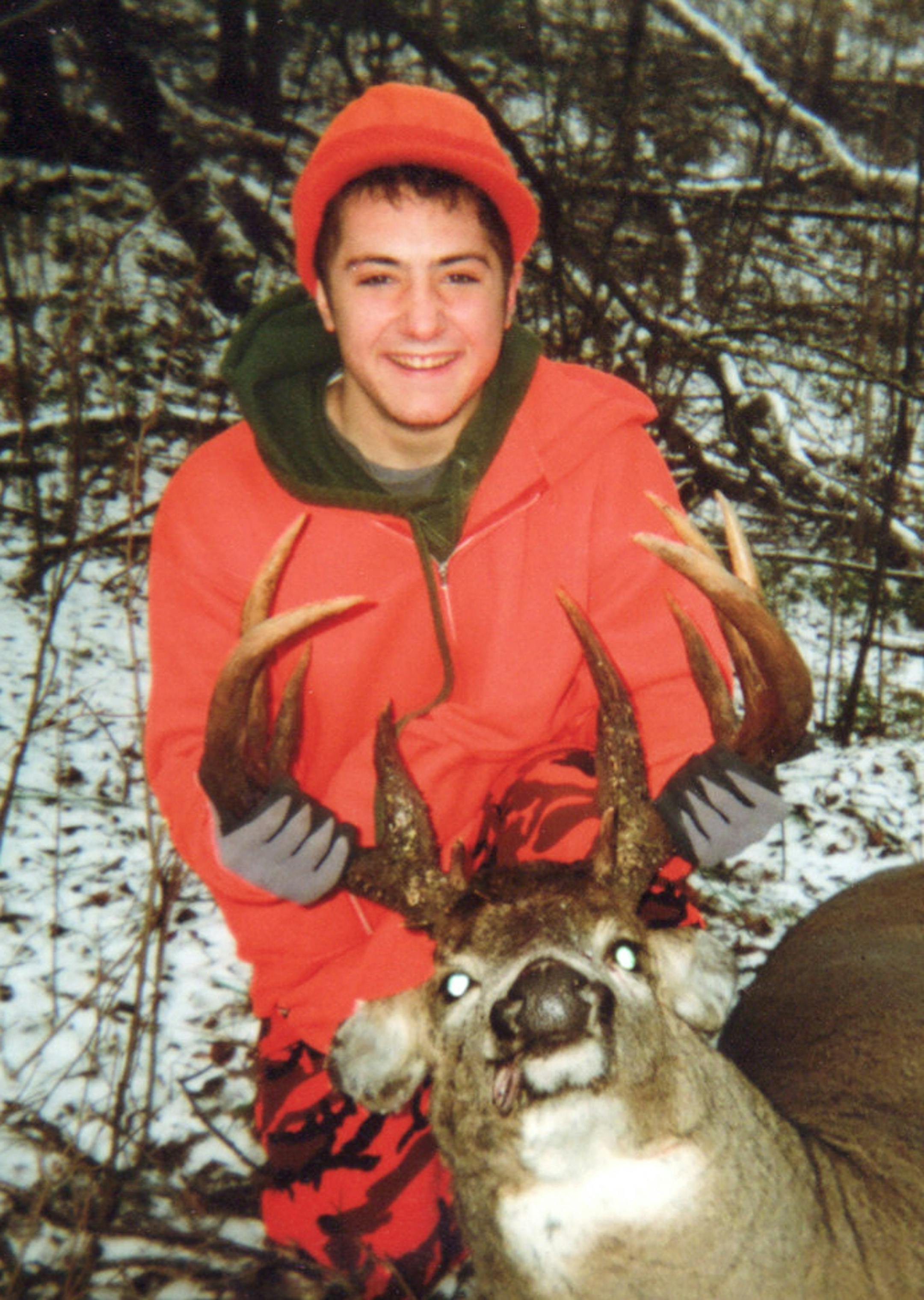 Jason Schmidt, 17, of St .Paul with a 15-point buck he shot this season near Grand Rapids, Minn.