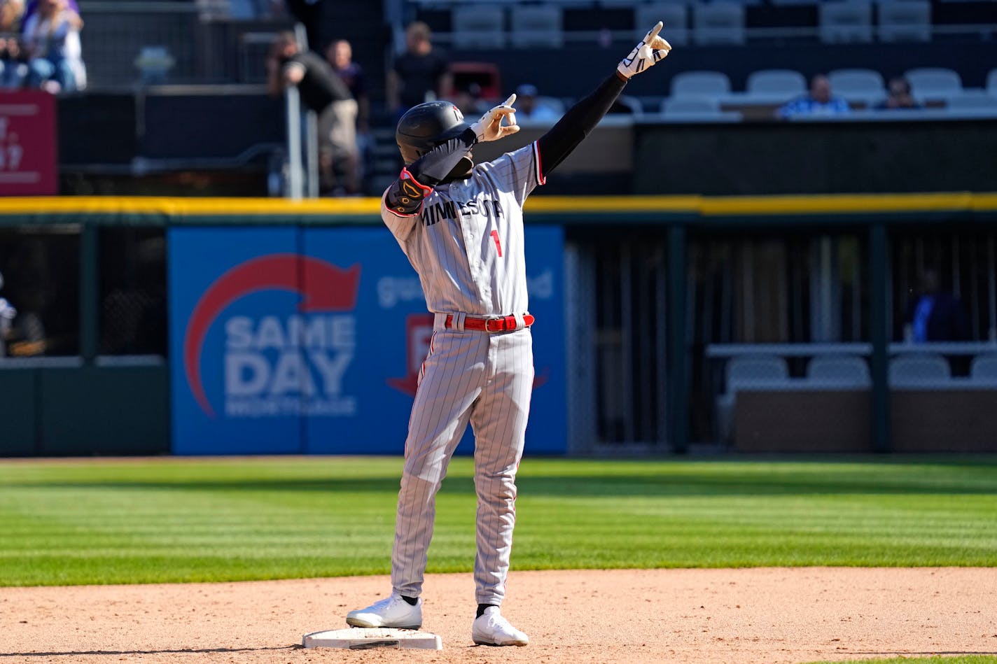 Minnesota Twins' Nick Gordon celebrates after hitting a one-run double during the 12th inning of a baseball game against the Chicago White Sox in Chicago, Thursday, May 4, 2023. (AP Photo/Nam Y. Huh)