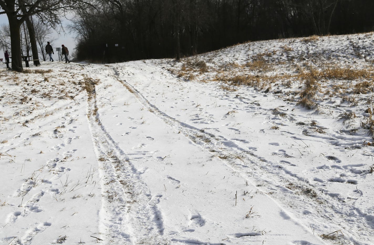 Elm Creek Rest Area, the site of an early morning homicide that took place Wednesday in Maple Grove. Here, tire tracks, possibly from the suspect, go through the rest area and out onto the ramp to I-94. The shooting triggered a high speed chase that concluded with the suspect crashing on I-694 near Rice Street before being shot and killed by law enforcement officers in Shoreview, MN, Wednesday, Dec. 17, 2014.](DAVID JOLES/STARTRIBUNE)djoles@startribune.com The chase for a shooting suspect at a r