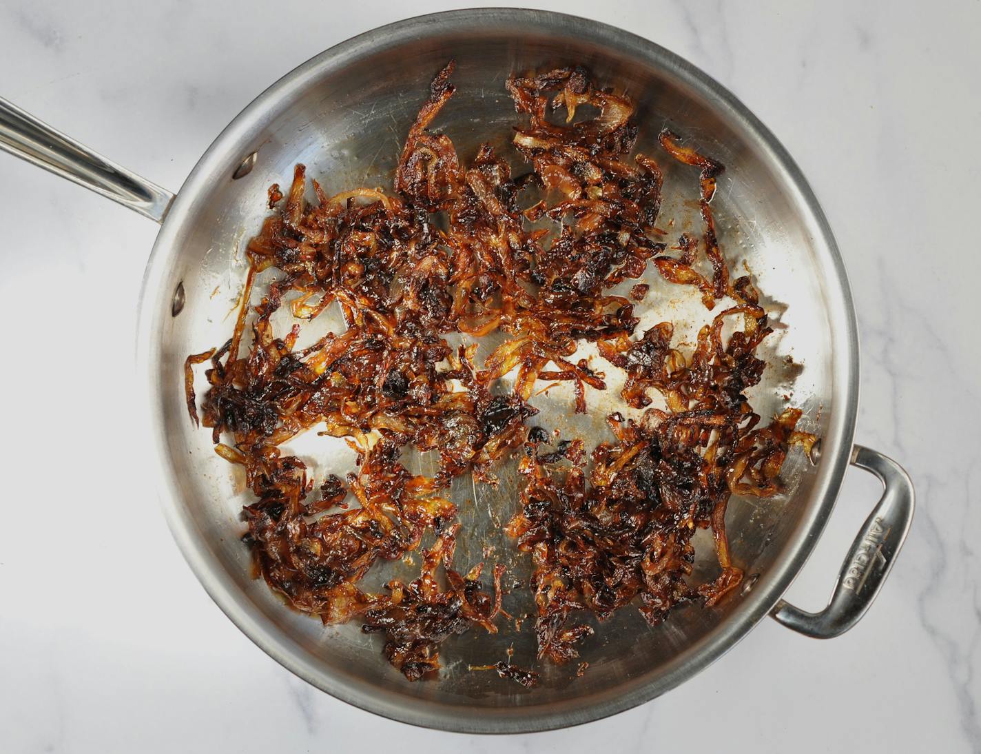 Caramelized onions can top burgers, flatbreads or add flavor and earthiness to a cheese board. Recipe and photo by Meredith Deeds, Special to the Star Tribune