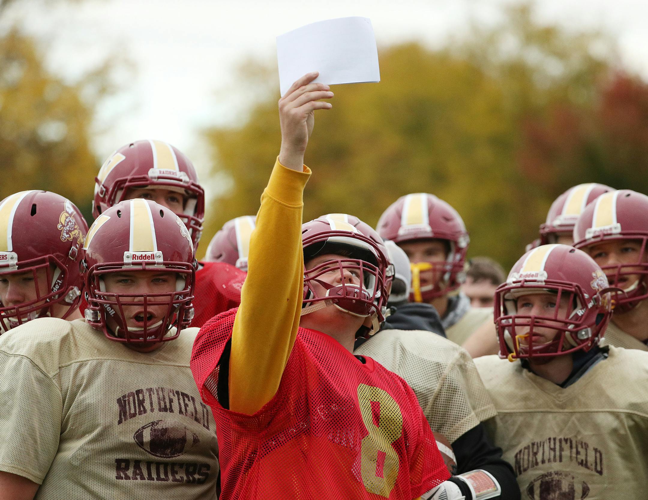 Northfield's Lars Prestemon held up a play as he practiced with his teammates Tuesday. ] ANTHONY SOUFFLE ï anthony.souffle@startribune.com Northfield football players practiced Tuesday, Oct. 10, 2017 at Northfield High School in Northfield, Minn.