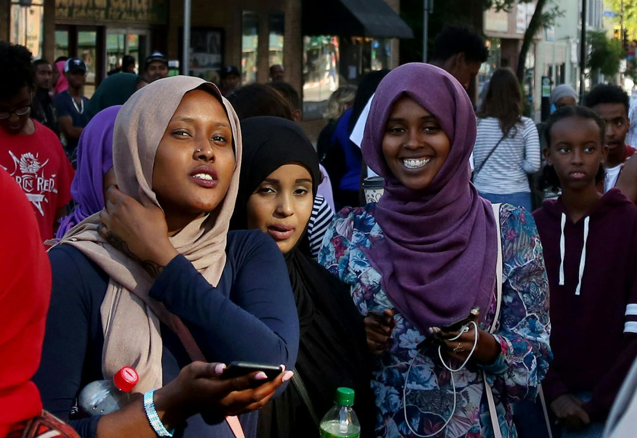 The Cedar-Riverside neighborhood along Cedar Avenue, known to some as "Little Mogadishu, " is home to many Somali immigrants and youth, as well as other East African immigrants. Here, children and young adults wait for a musical act to take the stage during the First Annual West Bank Block Party Saturday, Sept. 10, 2016, in Minneapolis, MN.] DAVID JOLES • david.joles@startribune.com Cedar Avenue cuts through the heart of one of Minneapolis's most historic and vibrant neighborhoods. Throug