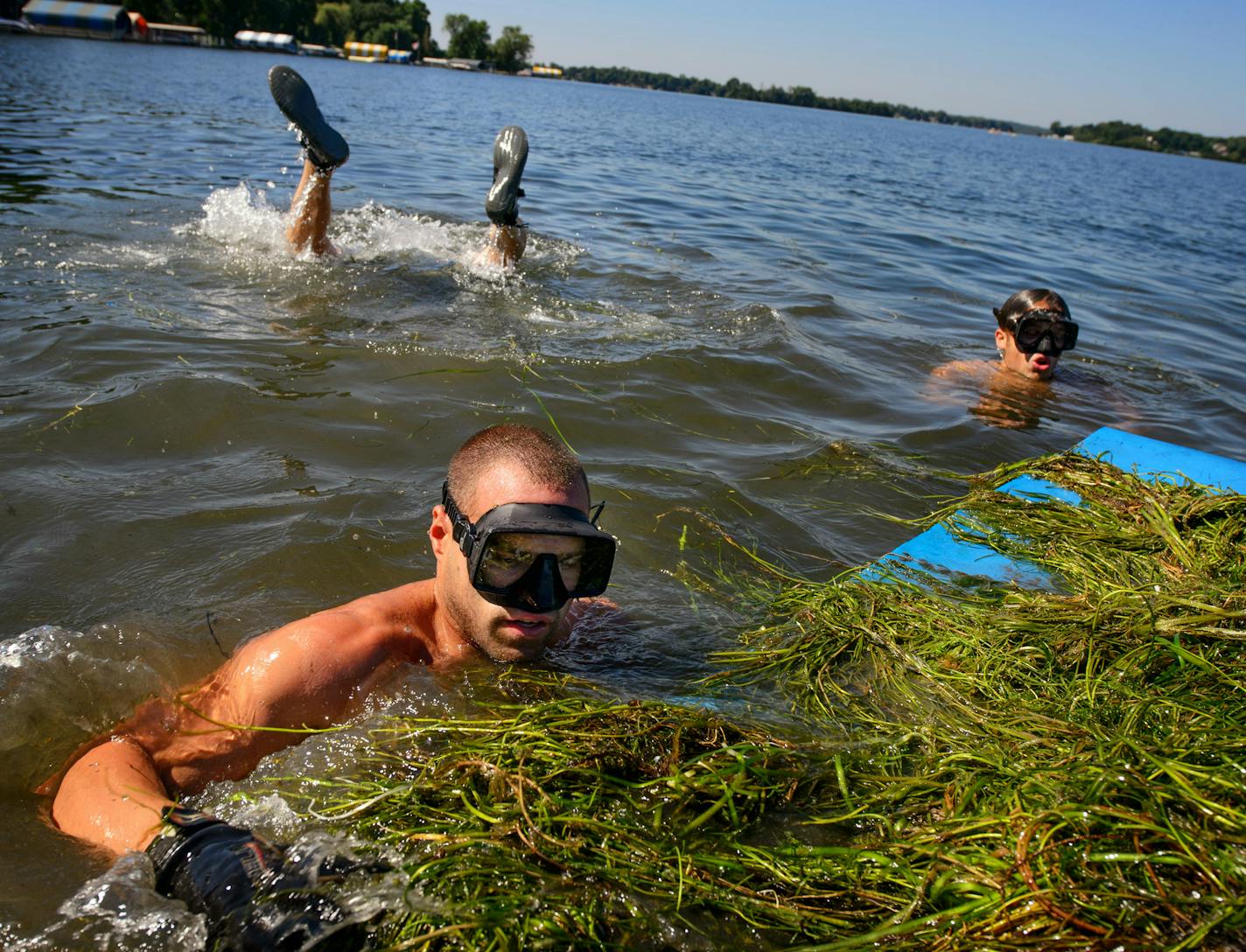 Life's A Beach Shoreline Services owner Josh Leddy and his crew cleaned lake weeds including milfoil for a customer who lives on Lake Minnetonka. They expected to pull three tons that day.