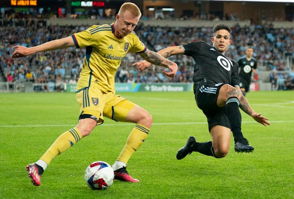 Luis Amarilla, right, challenged Real Salt Lake’s Justen Glad for possession when the teams met May 27 at Allianz Field.
