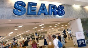 FILE - In this Thursday, May 17, 2012, file photo, shoppers walk into Sears in Peabody, Mass. Sears' announced Thursday, May 26, 2016, its fiscal firs