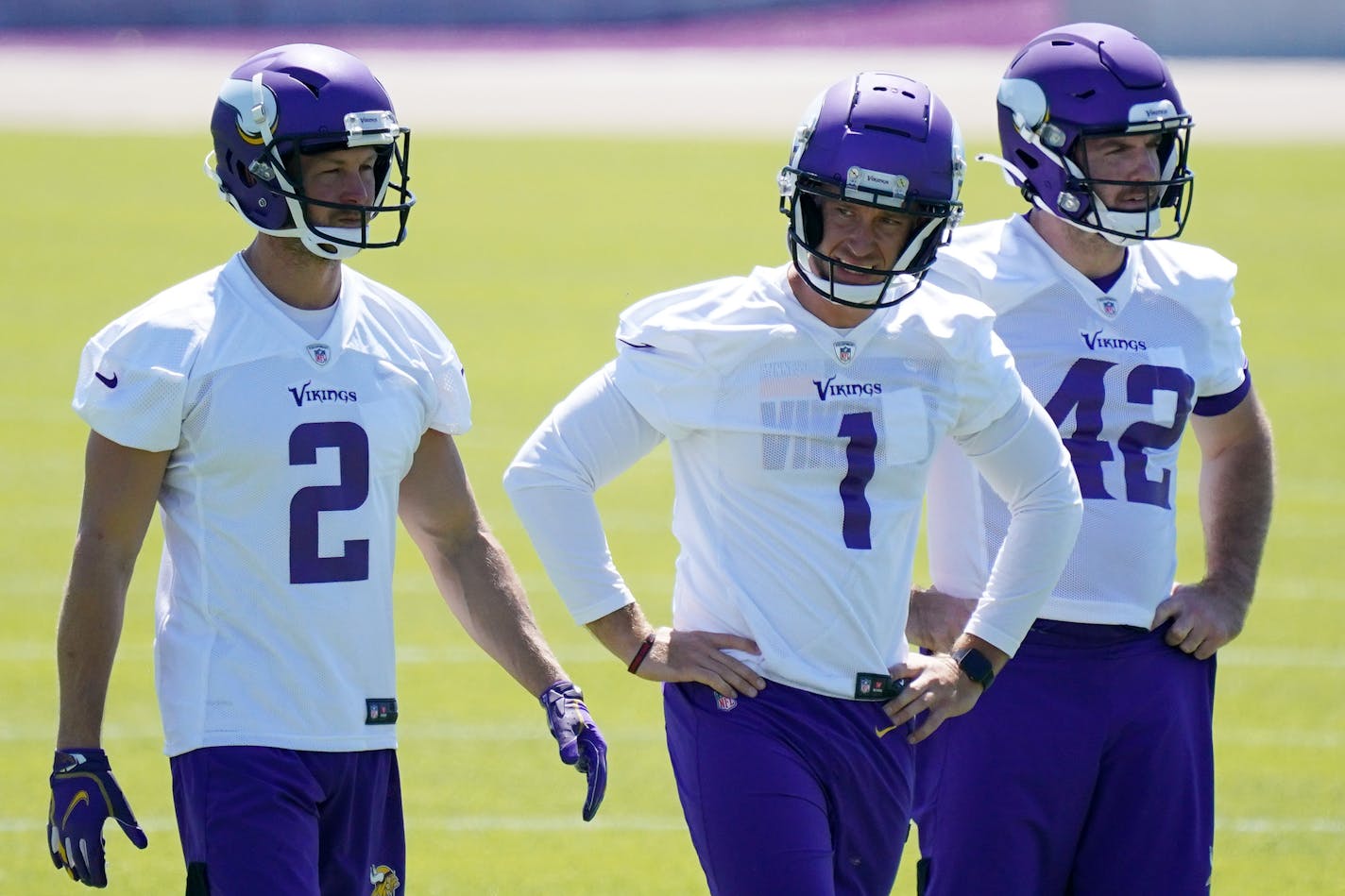 Vikings kicker Greg Joseph (1) with punter Britton Colquitt (2) and long snapper Andrew DePaola (42) during mandatory minicamp in June.