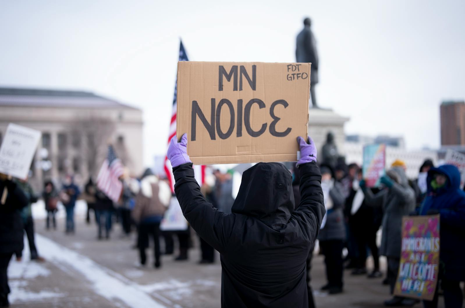 Demonstrators march in the Free America Walkout at the State Capitol in St. Paul on Tuesday, Jan. 20.