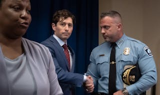 Minneapolis Mayor Jacob Frey shook hands with Minneapolis Police Chief Brian O'Hara after he spoke about how his department will comply with the DOJ i