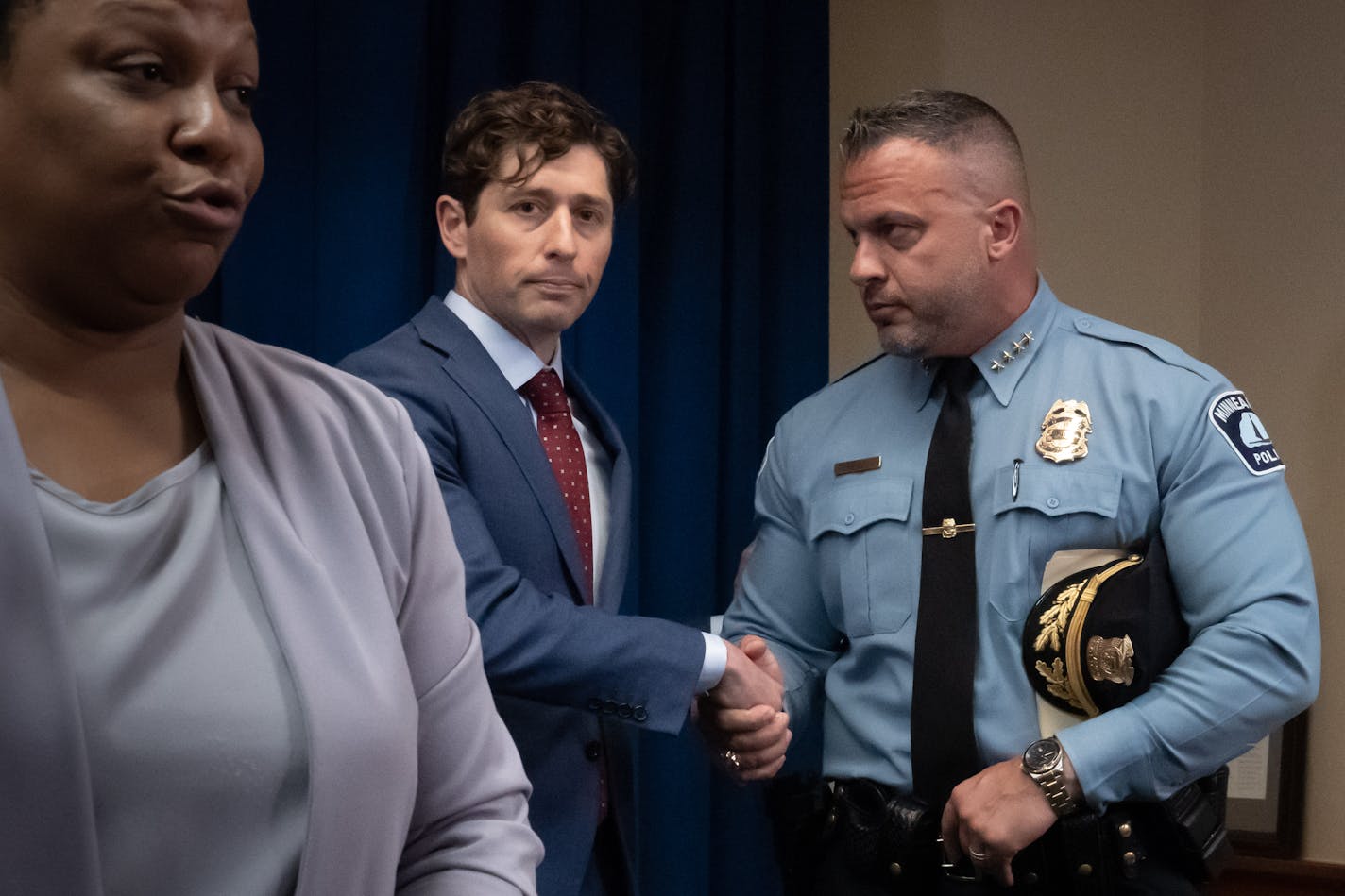 Minneapolis Mayor Jacob Frey shook hands with Minneapolis Police Chief Brian O'Hara after he spoke about how his department will comply with the DOJ investigation Friday, June 16, 2023 Minneapolis, Minn. Attorney General Merrick B. Garland, Associate Attorney General Vanita Gupta, Assistant Attorney General Kristen Clarke, First Assistant U.S. Attorney Ann Bildtsen for the District of Minnesota, Minneapolis Mayor Jacob Frey, and Minneapolis Police Chief Brian O'Hara will hold a press conference tomorrow on a civil rights matter. ] GLEN STUBBE • glen.stubbe@startribune.com