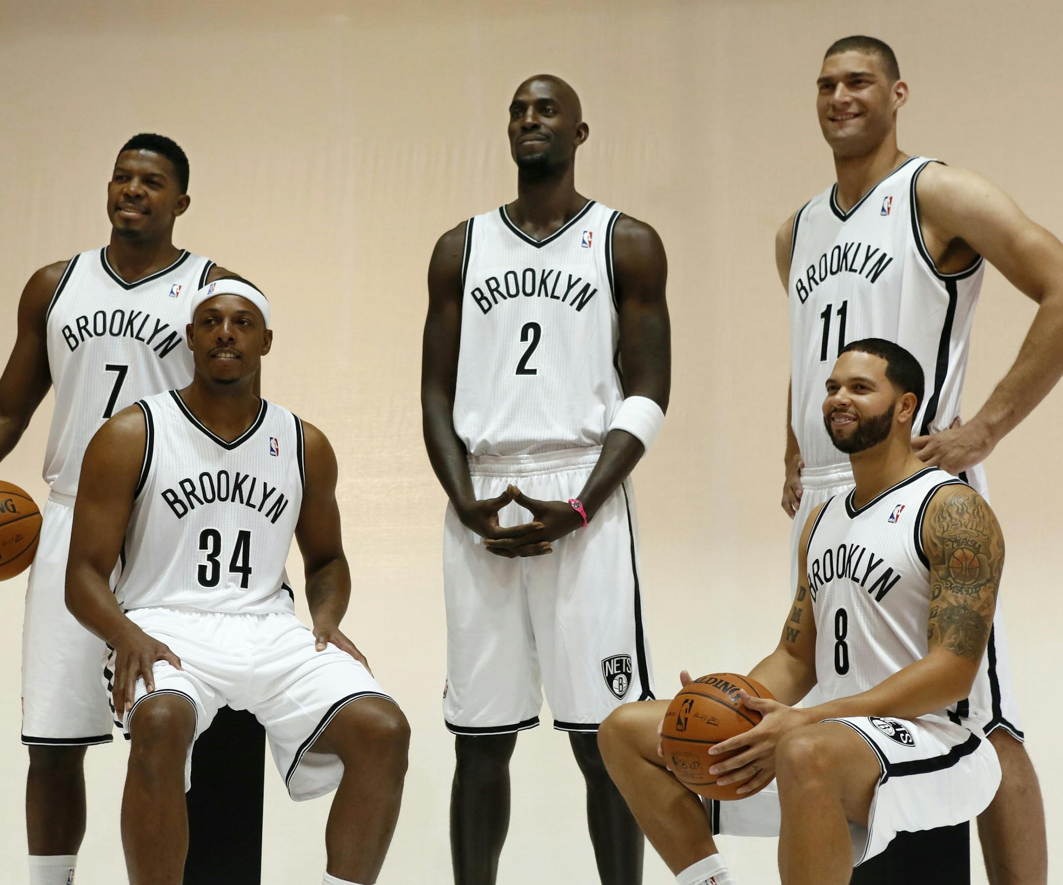 The Nets will open the season with a $100 million-plus payroll, including, from left to right, Joe Johnson, Paul Pierce, Kevin Garnett, Deron Williams, and Brook Lopez. The Nets will have to pay $90 million in luxury tax.