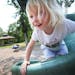 Three-year-old Sophia Yaggy of Cambridge played on a slide at Deer Creek 2nd Park in St. Francis Monday. Her mother, Laura, occasionally brings Sophia