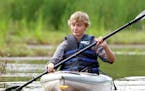 T08.08.2018 -- Steve Kuchera -- 081218.O.DNT.GeesepoliceC1 -- UWS biology student Sam Hanson kayaks near Pokegema Bay on Wednesday. Hanson is trying t