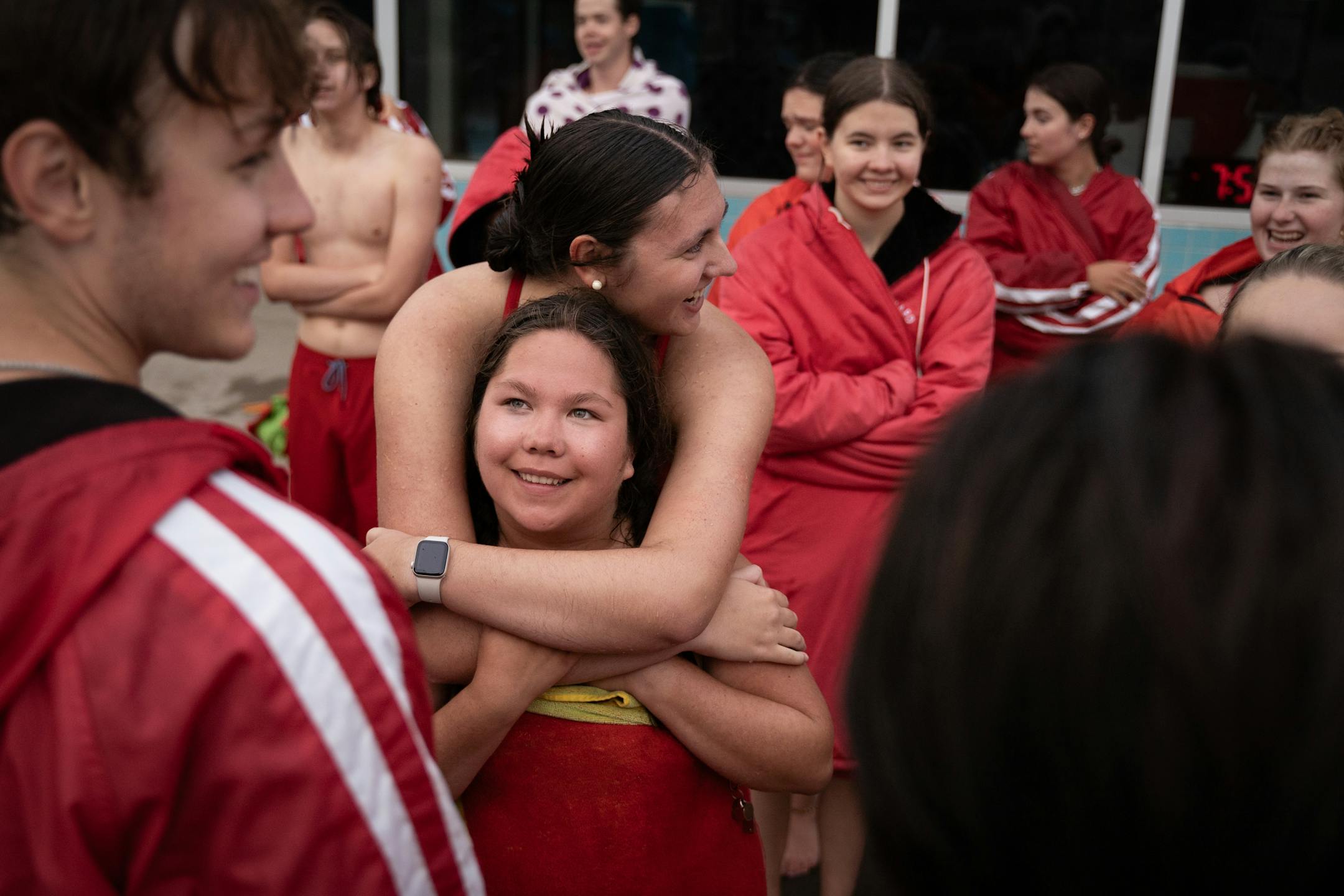 Lifeguards in training socialize between their lessons at the Bloomington Family Aquatic Center.