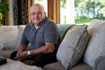 Paul Rosenau poses for a portrait at his home in Prior Lake on Monday. Rosenau and his wife won millions in the Powerball lottery in 2008 and set asid