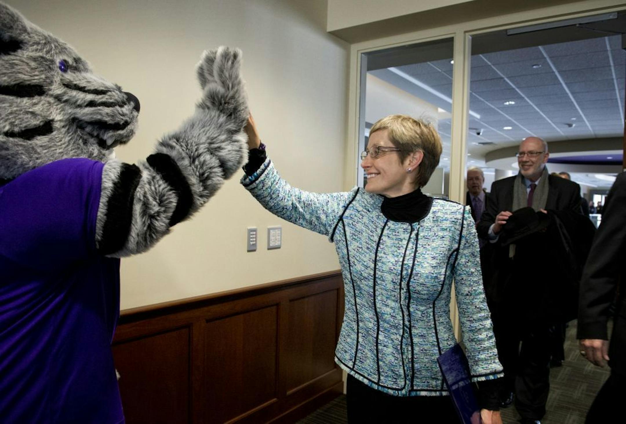 Julie Sullivan got a high five from school mascot Tommie. The University of St. Thomas announced its new president Julie Sullivan at a press conference today, Thursday, February 14, 2013. She is the school's first female and first lay person to serve as president. The Board of Trustees this morning elected the successor to Father Dennis Dease, who will retire June 30 after 22 years as 14th president of Minnesota�s largest private college or university.