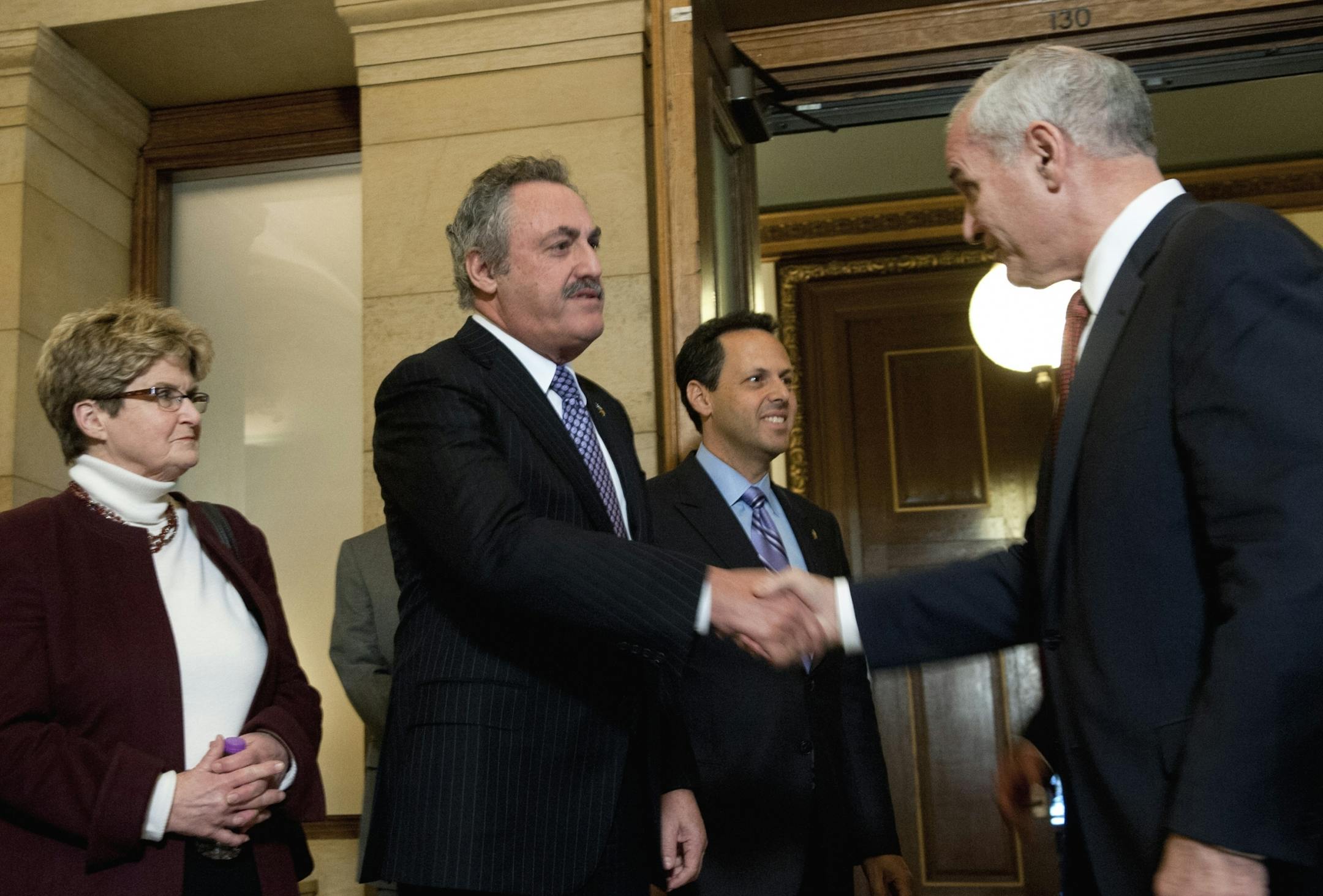 FILE -- In January, Zygi Wilf, center, and Gov. Mark Dayton met for three hours of stadium talks.