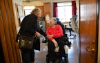 Magnolia Home resident Linda Moga says goodbye to Karen Menk, an RN with Accesible Space, as she leaves for the day Friday, March 15, 2024 in Coon Rap