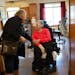 Magnolia Home resident Linda Moga says goodbye to Karen Menk, an RN with Accesible Space, as she leaves for the day Friday, March 15, 2024 in Coon Rap