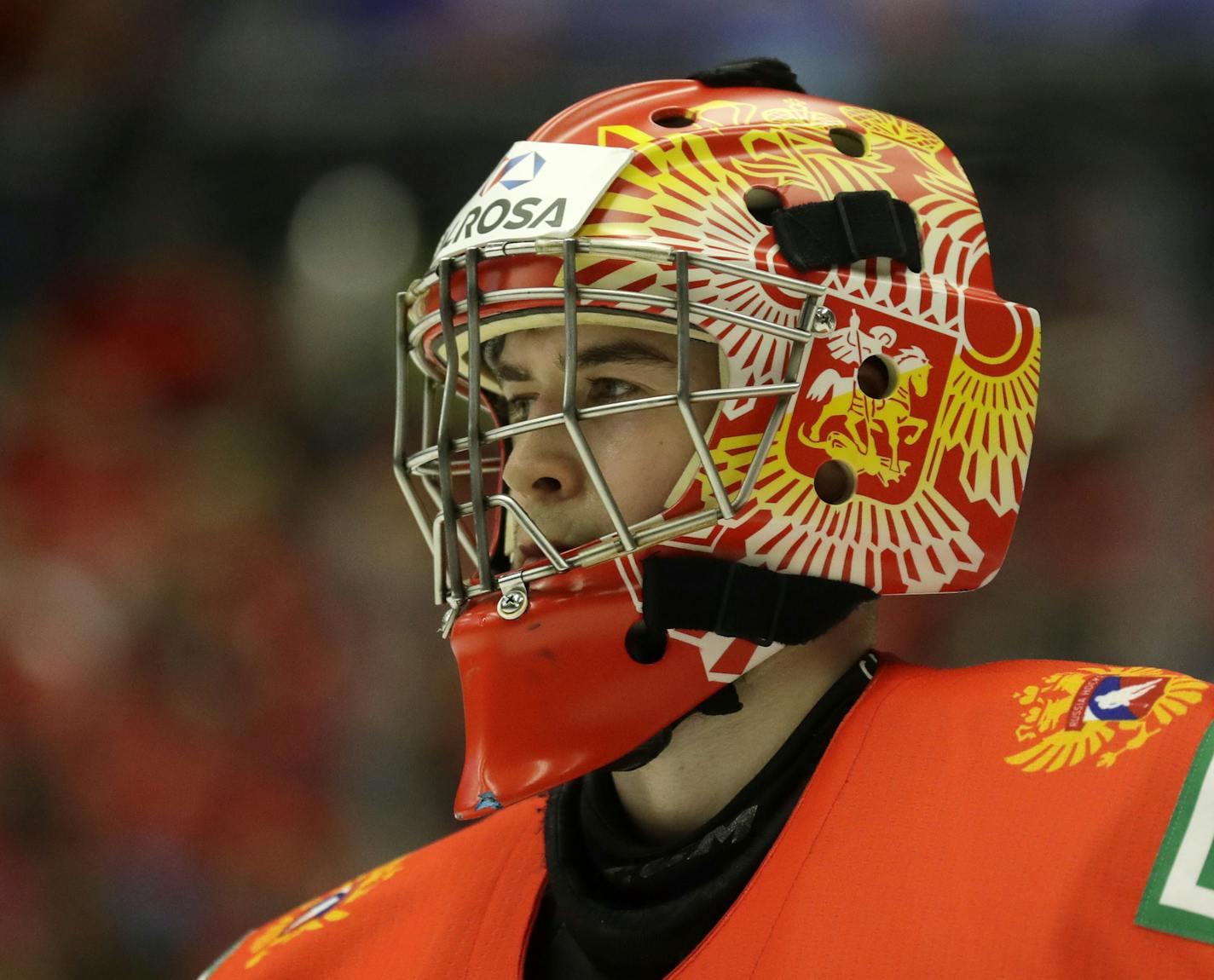 Russia's goaltender Yaroslav Askarov looks through his mask during the U20 Ice Hockey Worlds semifinal match between Sweden and Russia in Ostrava, Czech Republic, Saturday, Jan. 4, 2020. (AP Photo/Petr David Josek) ORG XMIT: PJO114