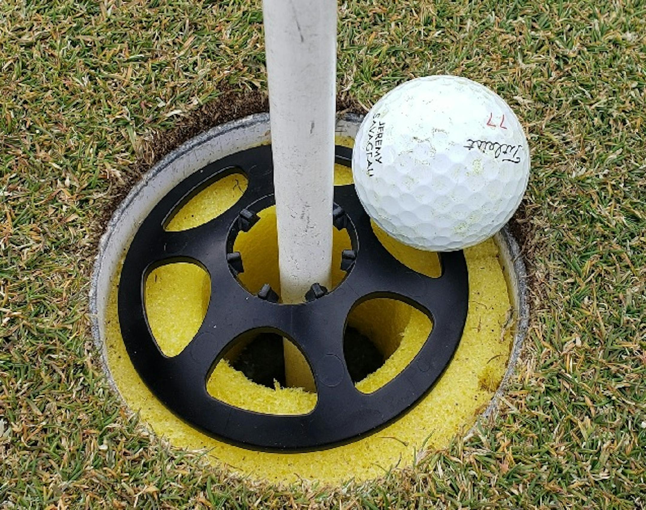 How Jeremy Savageau's ball appeared after scoring a hole-in-one on the third hole at the Refuge Golf Course in Oak Grove.