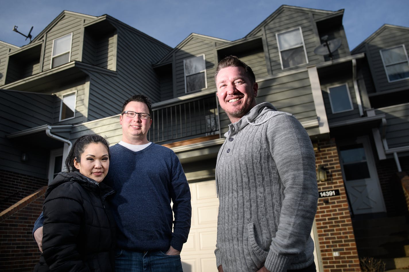 ReMax Results realtor Jeremy Peterson, right, and his clients Mike and Kimberly Lassonde, were photographed outside the Lassonde's new home Tuesday, Jan. 9, 2018 in Apple Valley. The Lassondes purchased the home before ever seeing it. ] AARON LAVINSKY &#xef; aaron.lavinsky@startribune.com For everyone except entry-level home buyers, 2017 was a year of superlatives: Sales were the best in at least a decade, prices hit new highs and houses sold in record time. That's according to a year-end report