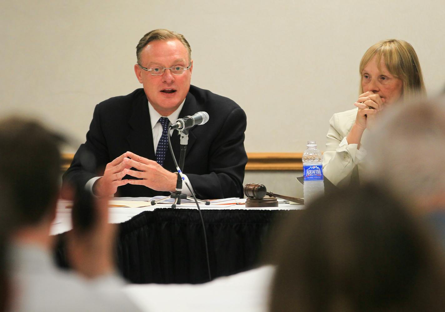 Ted Mondale took his seat with other members of the Minnesota Sports Facilities Authority after being named the executive director of the stadium project on June 22, 2012, in Minneapolis.