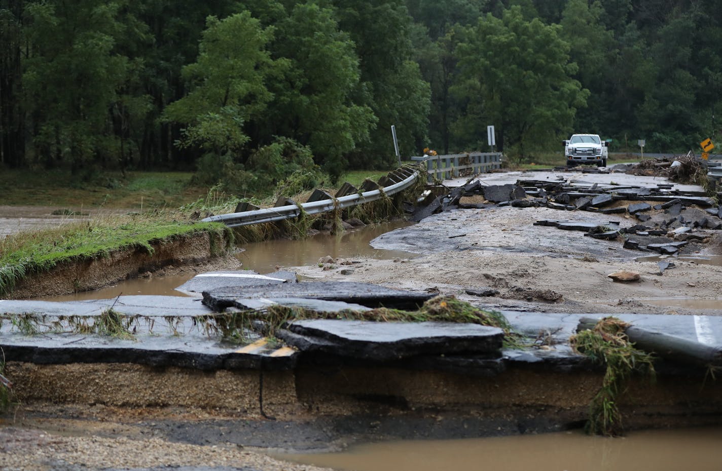 A swollen and raging Coon Creek knocked out a bridge on County Road P several miles outside Coon Valley, Wisc. was washed out on Tuesday, August 28, 2018. ] Shari L. Gross &#x2022; shari.gross@startribune.com Heavy rains inundated parts of southwestern Wisconsin southeast of LaCrosse, flooding roads and highways and prompting the evacuation of the tiny town of Coon Valley because of flash flooding.