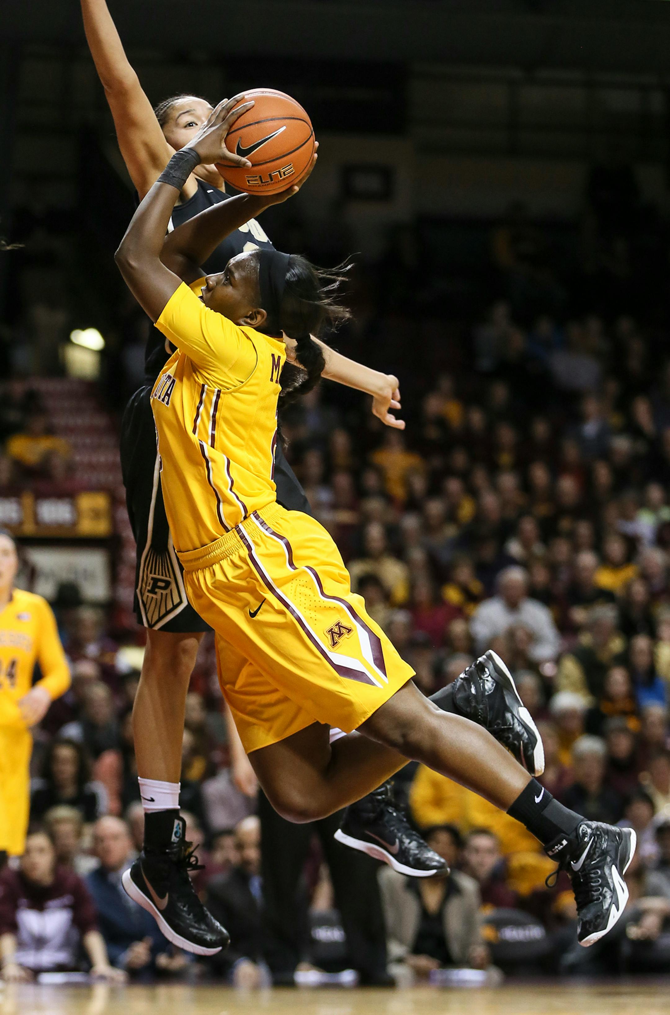 Gophers Stabresa McDaniel tripped as she went for a shot during the second half. The ball went out of bounds for Purdue's ball. ] RENEE JONES SCHNEIDER • reneejones@startribune.com Minnesota Gophers women's basketball verse. Purdue Boilermakers at Williams Arena at the University of Minnesota on Thursday, January 22, 2015 in Minneapolis, Minn.