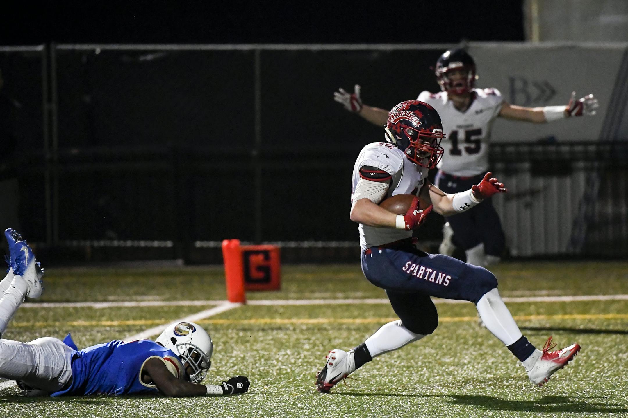 Orono's Chad Mrachek (12) scored a touchdown off a 28-yard pass in the first quarter against the SMB Wolfpack. ] Aaron Lavinsky ¥ aaron.lavinsky@startribune.com Orono played the SMB Wolfpack in a Class 4A, Section 5 football semifinal game on Saturday, Oct. 27, 2018 at The Blake School in Hopkins, Minn.
