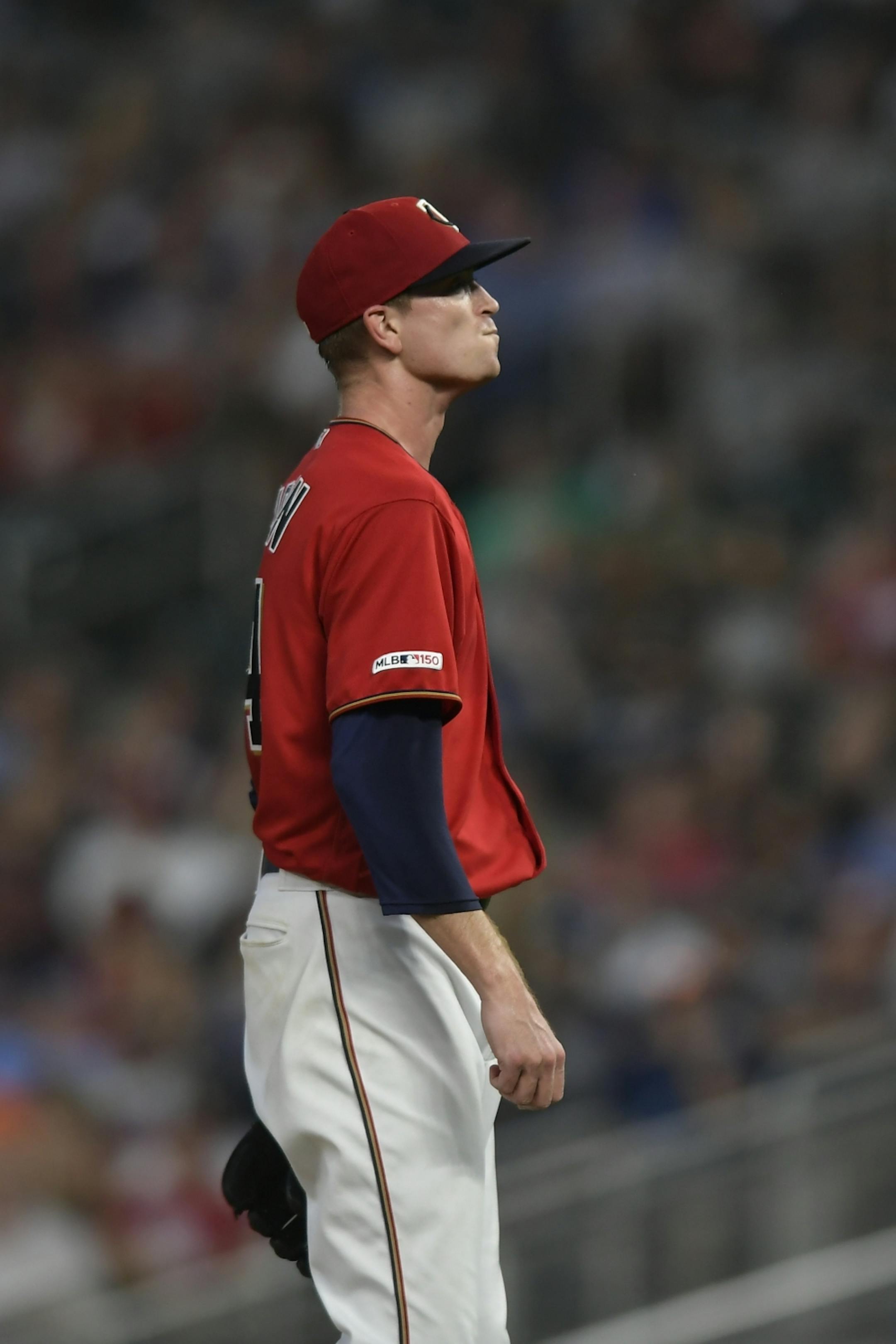 Minnesota Twins starting pitcher Kyle Gibson (44) reacted after the Kansas City Royals scored a run off a bases loaded walk in the top of the second inning.