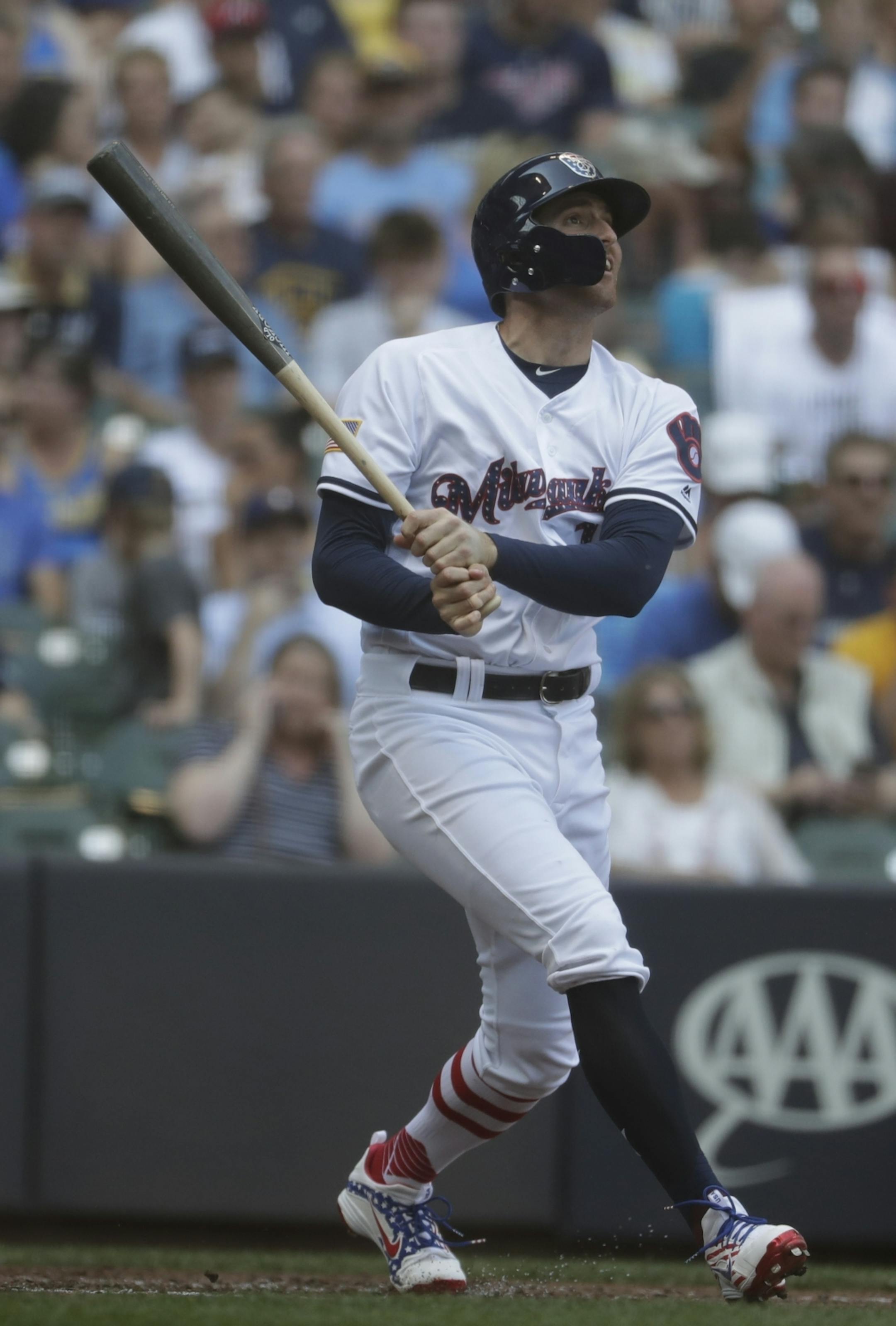 Milwaukee Brewers' Brad Miller hits a double during the third inning of a baseball game against the Minnesota Twins Tuesday, July 3, 2018, in Milwaukee.