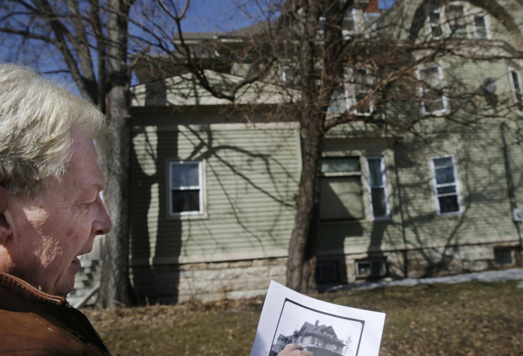 Michael Crow owns the south Minneapolis rooming house constructed by master builder T.P. Healy and is trying to sell it to a developer.